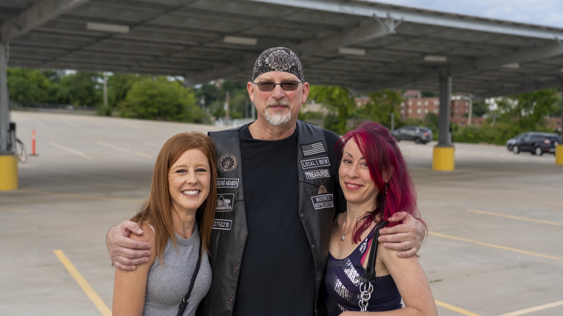 Chuck DeMoulin, EWRC1 Treasurer, with his wife Deb (right) and Deb's close friend at a club gathering.